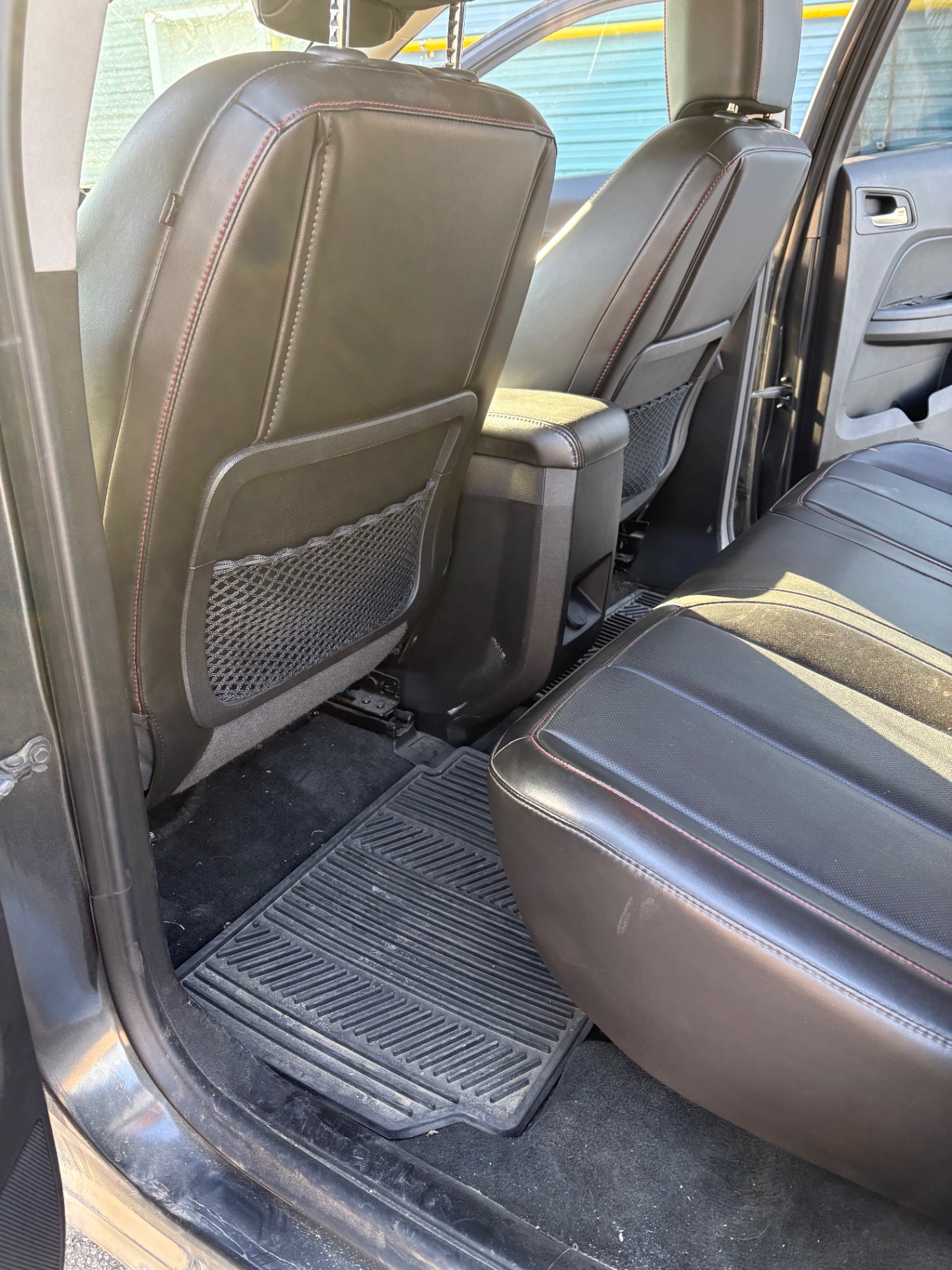 SUV rear seats & floor — before Draude Interior Detailing